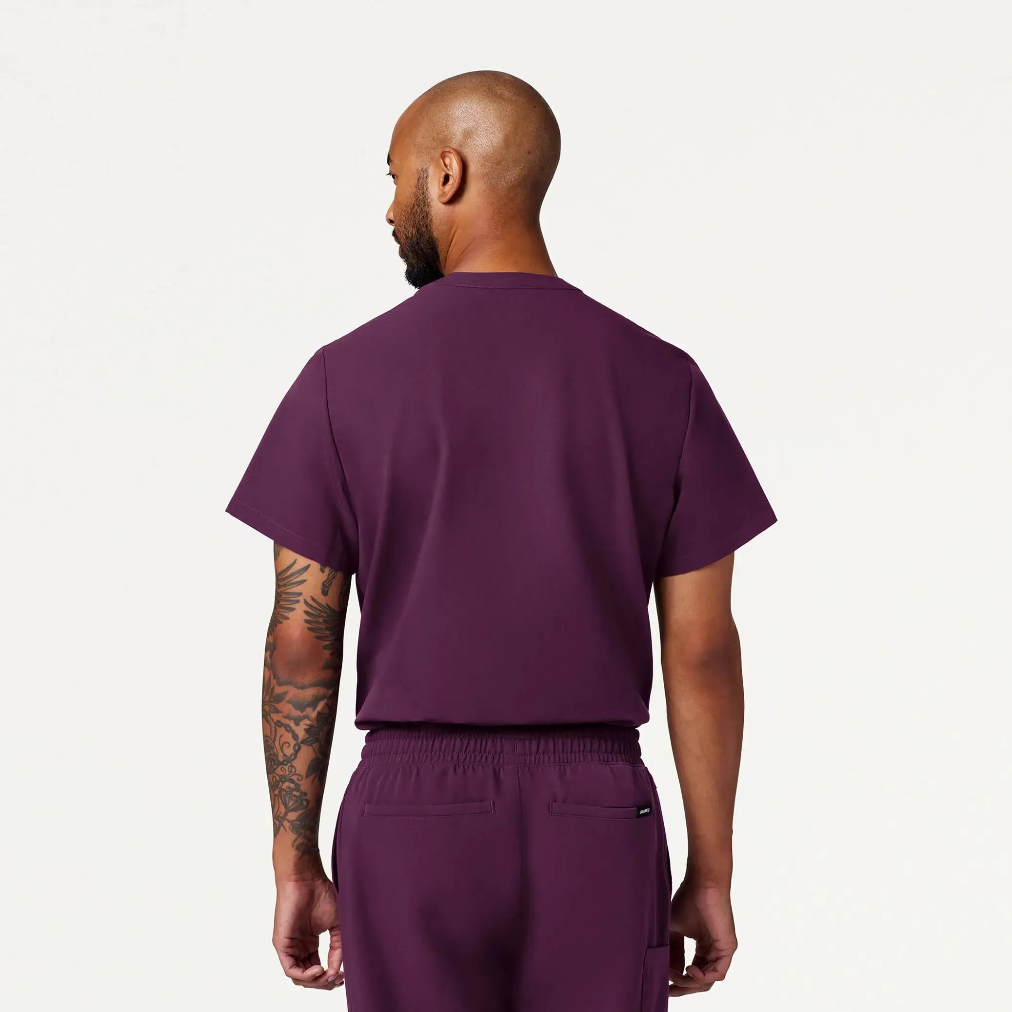 Jaanuu Men's Reeve Henley Scrub Top - Dark Amethyst