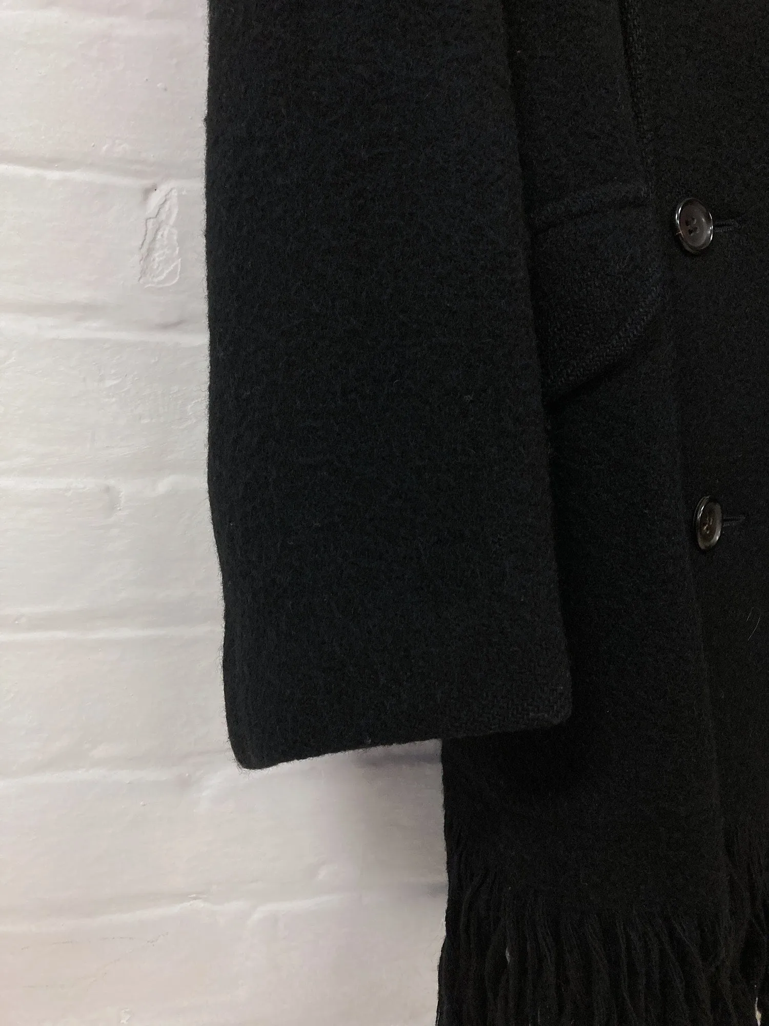 Junya Watanabe Comme des Garcons AW1992 black wool melton tassel hem peacoat