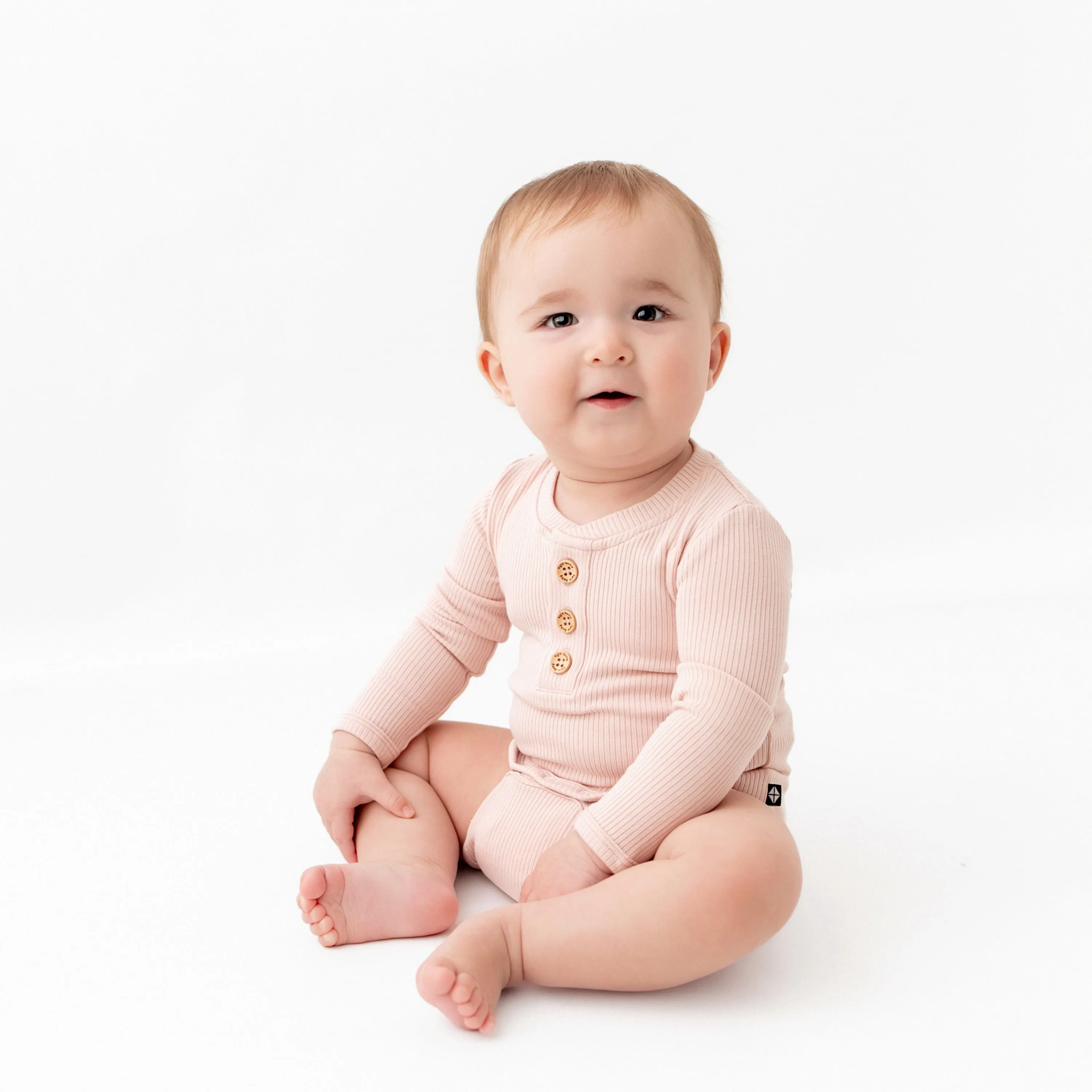 Ribbed Long Sleeve Henley Bodysuit in Blush