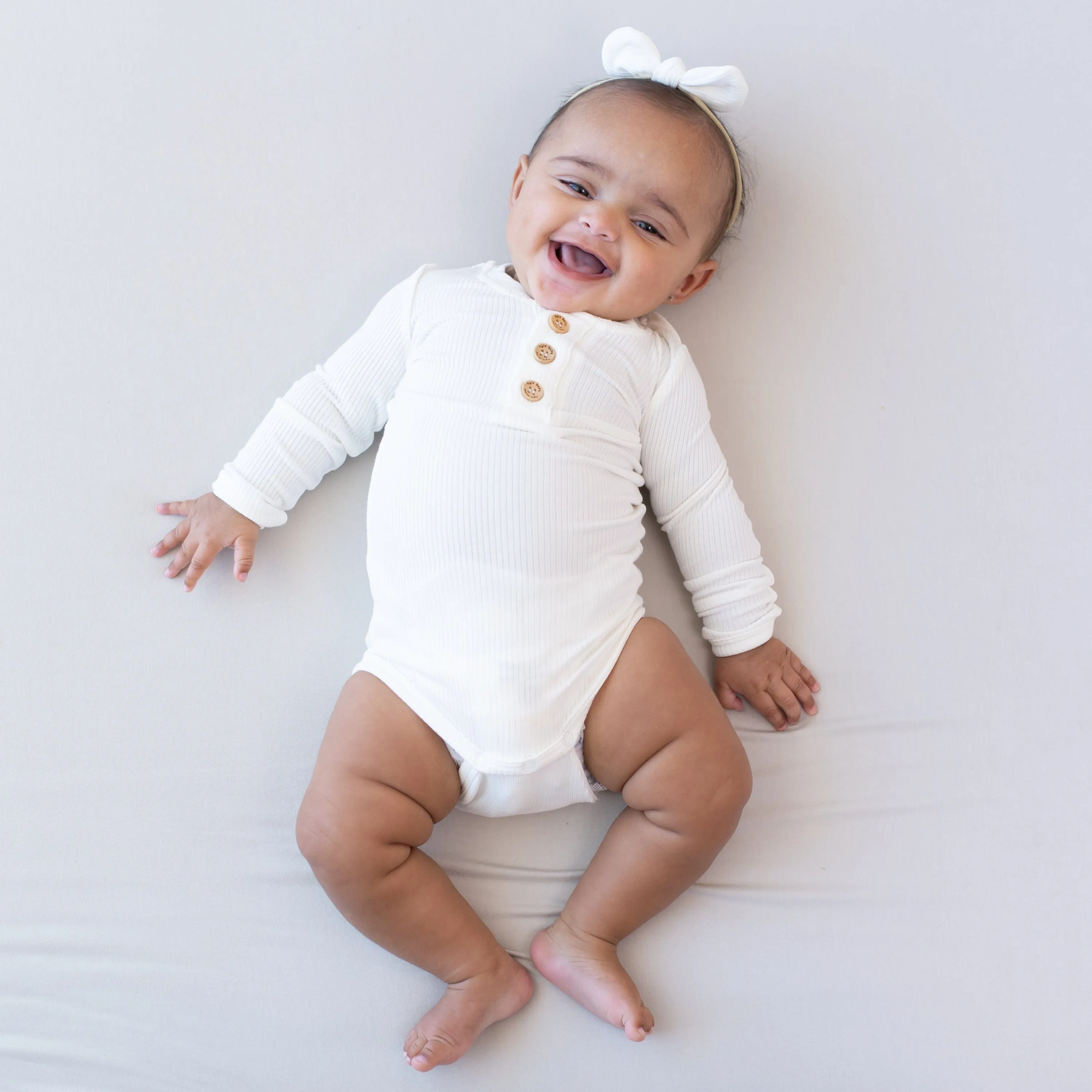 Ribbed Long Sleeve Henley Bodysuit in Cloud